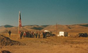 Group of people near flag pole